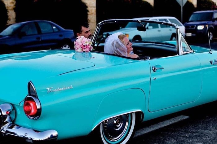 Annie with classic muscle car